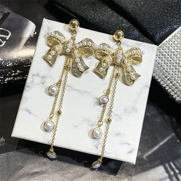 fyuan korea long tassel pearl drop earrings for women 2020 cute bowknot dangle earrings statement jewelry, Silver
fyuan korea long tassel pearl drop earrings for women 2020 cute bowknot dangle earrings statement jewelry, Silver