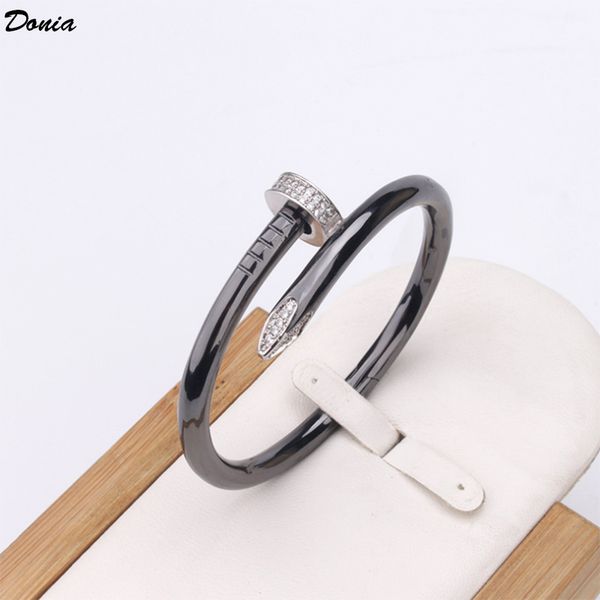 donia jewelry party european and american fashion cardi series large nail micro inlaid zirconia bracelet women's black gold bracelet
donia jewelry party european and american fashion cardi series large nail micro inlaid zirconia bracelet women's black gold bracelet