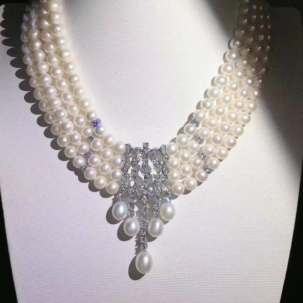 hand knotted 4strands 7-8mm white freshwater pearl micro inlay zircon accessories necklace fashion jewelry, Silver
hand knotted 4strands 7-8mm white freshwater pearl micro inlay zircon accessories necklace fashion jewelry, Silver