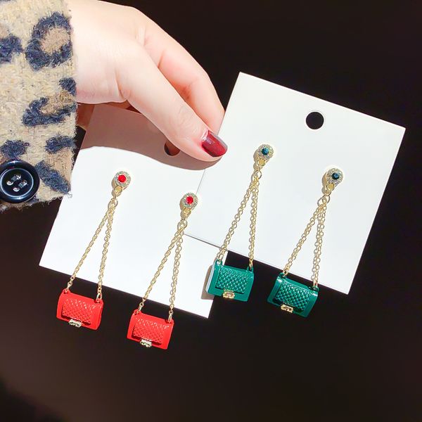 small bag earrings female south korean fashion 2020 new tide creative joker character long web celebrity temperament, Golden;silver
small bag earrings female south korean fashion 2020 new tide creative joker character long web celebrity temperament, Golden;silver