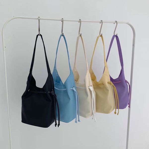 2020 summer new solid women handbag ladies single shoulder bag nylon ice cream cone bag designer drawstring female small
2020 summer new solid women handbag ladies single shoulder bag nylon ice cream cone bag designer drawstring female small