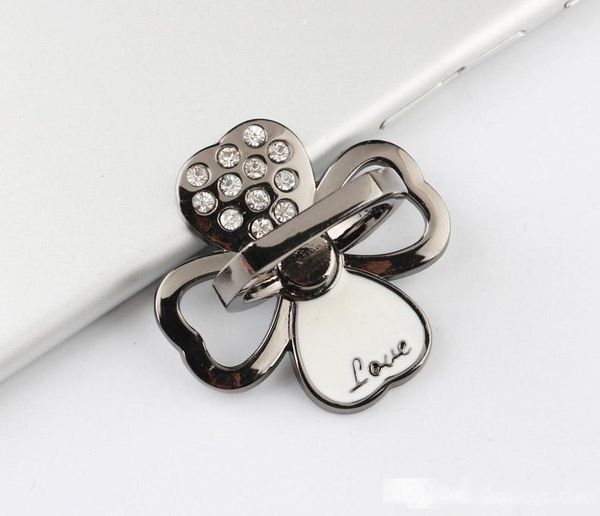 universal 360 degree metal four leaf clover crystal finger ring holder phone stand for iphone samsung mobile phones
universal 360 degree metal four leaf clover crystal finger ring holder phone stand for iphone samsung mobile phones