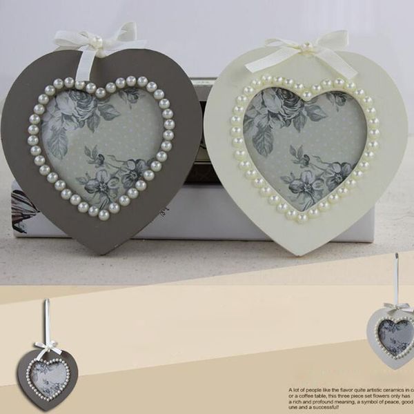 heart shaped imitation pearls p frame 4 inch wooden hanging picture frame for home tabledecoration
heart shaped imitation pearls p frame 4 inch wooden hanging picture frame for home tabledecoration