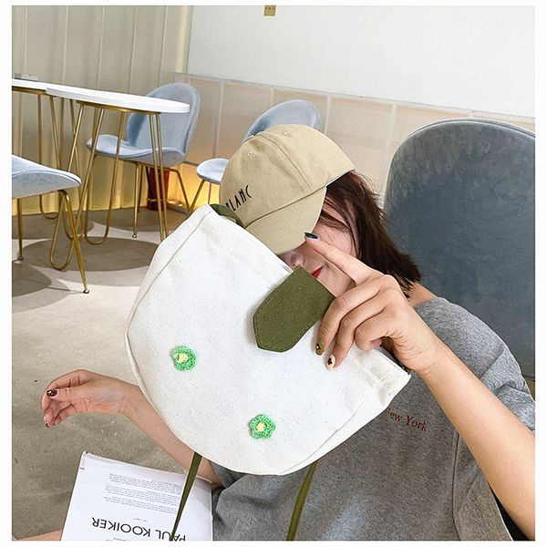 m586 simple fresh messenger bag for women casual sweet canvas flower embroidery small cloth bag
m586 simple fresh messenger bag for women casual sweet canvas flower embroidery small cloth bag
