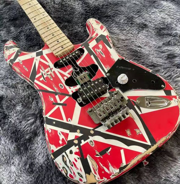 aged eddie van halen electric guitar white black stripe red , tremolo bridge & locking nut ,can customized
aged eddie van halen electric guitar white black stripe red , tremolo bridge & locking nut ,can customized