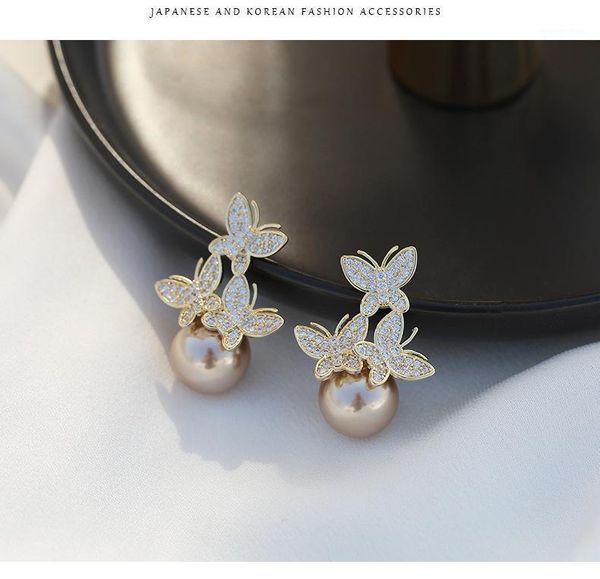 shiny side new accessories crystal butterfly stud earrings for women simple style gift elegant pearl beads earrings1, Golden;silver
shiny side new accessories crystal butterfly stud earrings for women simple style gift elegant pearl beads earrings1, Golden;silver