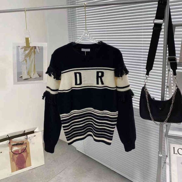 2022 factory wholesale new autumn tassel contrast color round neck terry loose and comfortable college style pullover sweater, Black
2022 factory wholesale new autumn tassel contrast color round neck terry loose and comfortable college style pullover sweater, Black