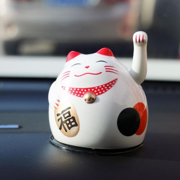 2.5"plastic electric hand swing cute lucky cat ornaments,decorated in the car, home, office, etc., bring good luck cat crafts 
2.5"plastic electric hand swing cute lucky cat ornaments,decorated in the car, home, office, etc., bring good luck cat crafts