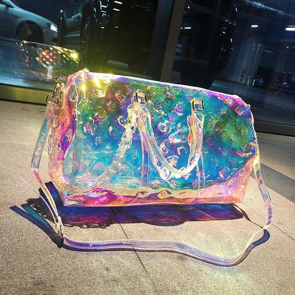 laser colorful brand travel bag transparent bright luxury reflective fitness luggage bag slung carry on portable suitcase
laser colorful brand travel bag transparent bright luxury reflective fitness luggage bag slung carry on portable suitcase