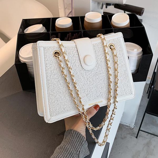 unique design autumn/winter handbags new fashion messenger bag western style shoulder armpit small square bag width: 24cm 
unique design autumn/winter handbags new fashion messenger bag western style shoulder armpit small square bag width: 24cm