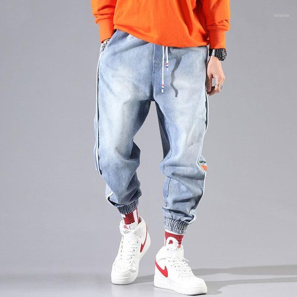 fashion streetwear men jeans loose fit blue color side stripe spliced cargo pants harem jeans korean style hip hop men1
fashion streetwear men jeans loose fit blue color side stripe spliced cargo pants harem jeans korean style hip hop men1