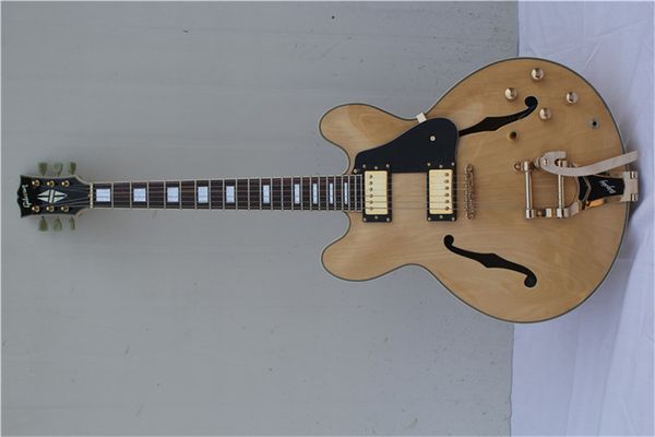 flyoung g-335 semi hollow double f hole large rocker electric guitar log color piano body gold jade button
flyoung g-335 semi hollow double f hole large rocker electric guitar log color piano body gold jade button