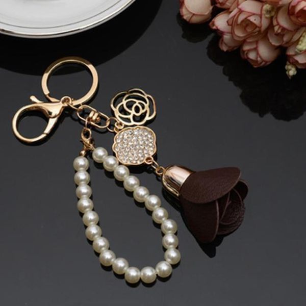 new camellia flower leather keychain bag pendant car ornaments creative gifts long key chain buckle key ring 17 colors eh816 h sqckas
new camellia flower leather keychain bag pendant car ornaments creative gifts long key chain buckle key ring 17 colors eh816 h sqckas