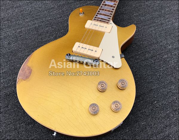 custom shop heavy relic gold goldelectric guitar one piece mahogany body & neck, p-90 pickups, wrap around tailpiece, grover tuners
custom shop heavy relic gold goldelectric guitar one piece mahogany body & neck, p-90 pickups, wrap around tailpiece, grover tuners
