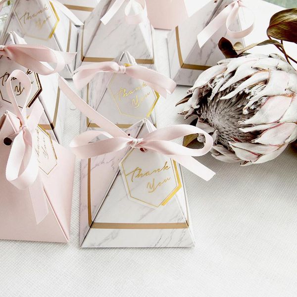 10pcs chocolate box wedding favors new pyramid style candy box gift boxes with thanks card & ribbon party supplies
10pcs chocolate box wedding favors new pyramid style candy box gift boxes with thanks card & ribbon party supplies