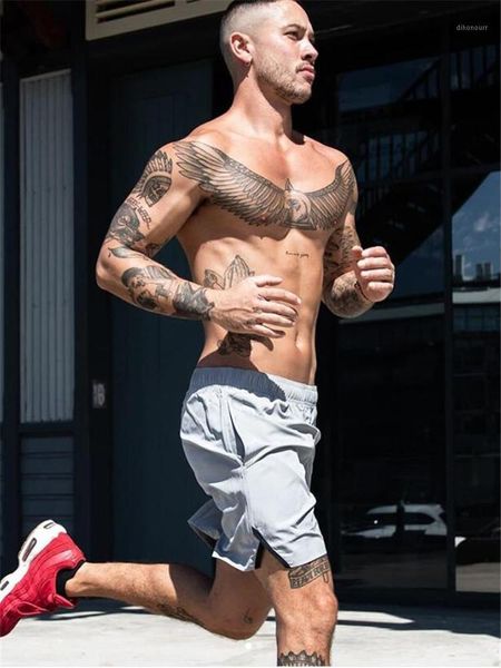 men's shorts brand summer fitness mens sportswear gyms short pants fast dry joggers men bodybuilding workout beach1, White;black
men's shorts brand summer fitness mens sportswear gyms short pants fast dry joggers men bodybuilding workout beach1, White;black