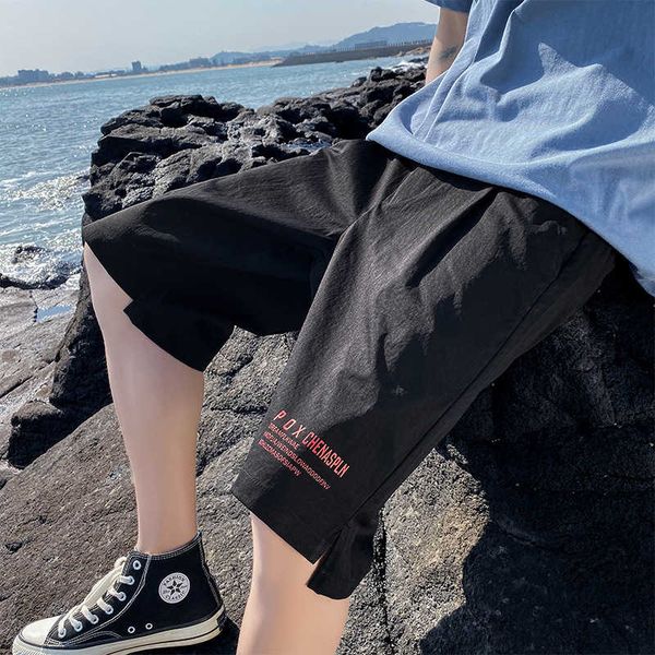 shorts men's summer korean casual loose capri sports thin fashion clothing pants, White;black
shorts men's summer korean casual loose capri sports thin fashion clothing pants, White;black