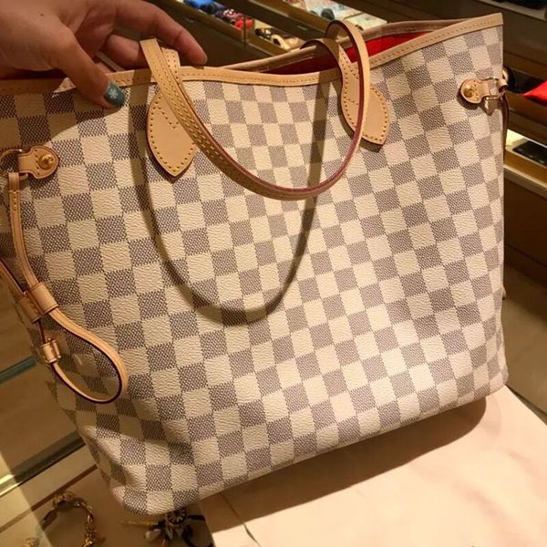 luxury women's old flower one shoulder cross leather net red shopping bag
luxury women's old flower one shoulder cross leather net red shopping bag