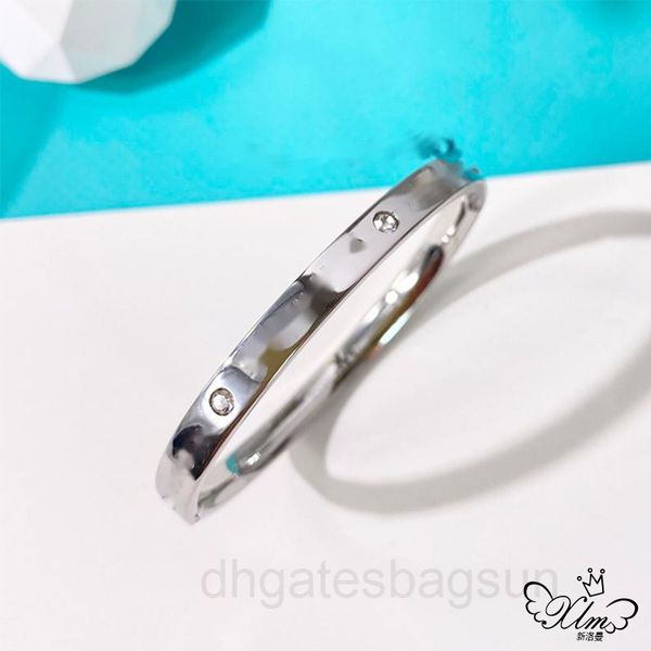 t's popular titanium steel t's diamond letter buckle bracelet has two groups of letters on the surface and six zircon inlays dw97, Black
t's popular titanium steel t's diamond letter buckle bracelet has two groups of letters on the surface and six zircon inlays dw97, Black