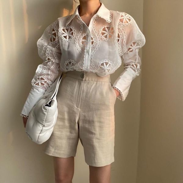 hollow out floral embroidery temperament shirt women see through long sleeve loose white blouse 2020 trend
hollow out floral embroidery temperament shirt women see through long sleeve loose white blouse 2020 trend