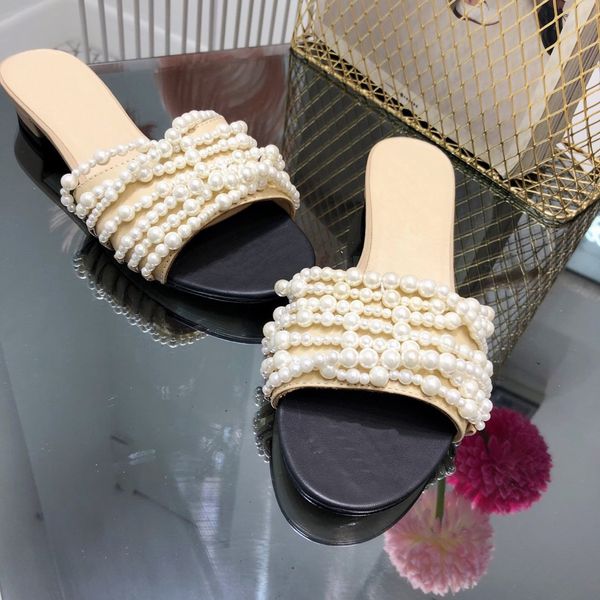spring and summer 2020 new pearl chain knitted women's slippers low heel flat bottom sandals black temperament women's shoes
spring and summer 2020 new pearl chain knitted women's slippers low heel flat bottom sandals black temperament women's shoes