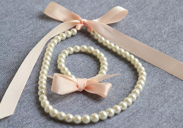 chokers peach pearl sets,,ivory pearl,ribbon girl necklace&bracelet ,flower gift party favor baby play necklace sp32, Golden;silver
chokers peach pearl sets,,ivory pearl,ribbon girl necklace&bracelet ,flower gift party favor baby play necklace sp32, Golden;silver