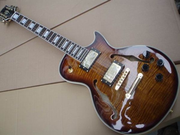 wholesale new custom small jazz electric guitar semi hollow body with f hole in brown burst 100522
wholesale new custom small jazz electric guitar semi hollow body with f hole in brown burst 100522