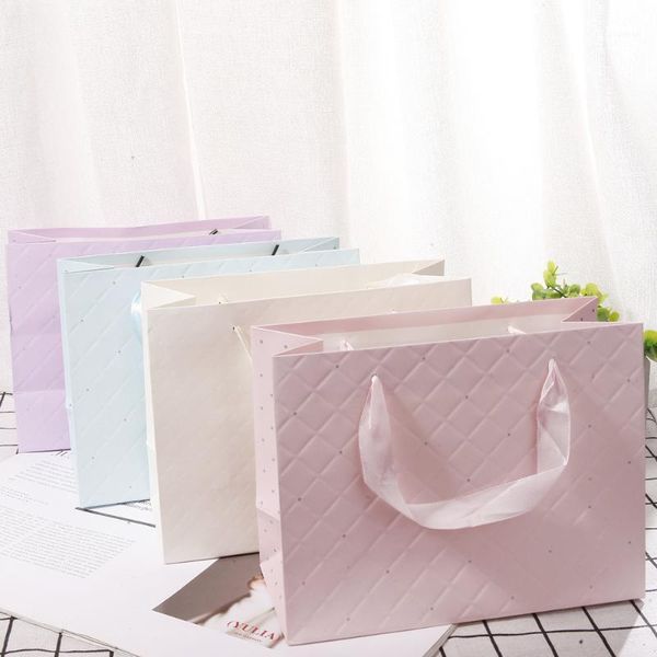 light embossed four color white card handbag simple gift bag clothing shopping bag paper bag can be customized cross border foreign trade1
light embossed four color white card handbag simple gift bag clothing shopping bag paper bag can be customized cross border foreign trade1
