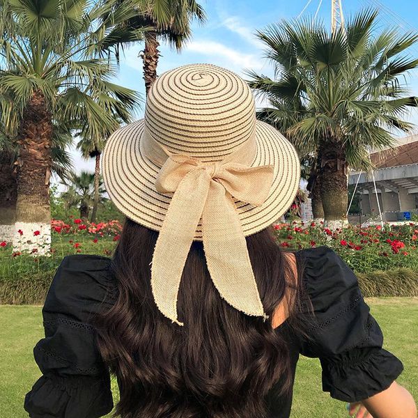 new style seaside big cornice hat women's summer korean tide straw hat black bow anti ho solid color beach, Blue;gray
new style seaside big cornice hat women's summer korean tide straw hat black bow anti ho solid color beach, Blue;gray
