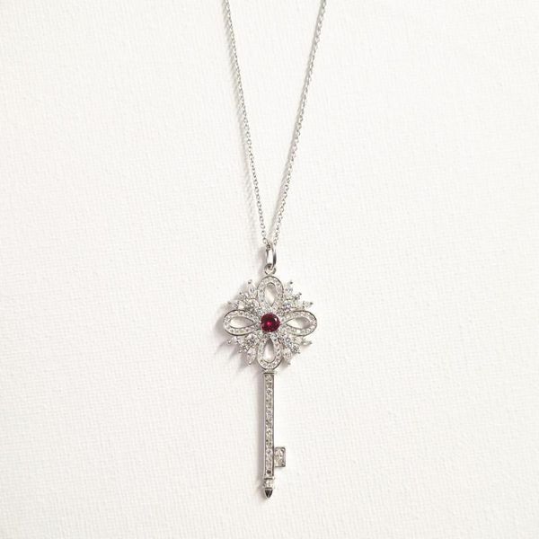 classic female s925 sterling silver hollow key inlaid red dark blue zircon pendant necklace sterling silver key sweater chain1
classic female s925 sterling silver hollow key inlaid red dark blue zircon pendant necklace sterling silver key sweater chain1