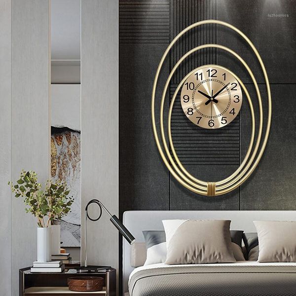 modern simple metal wall clock in northern europe creative home fashion personality atmosphere decoration art mute clock1
modern simple metal wall clock in northern europe creative home fashion personality atmosphere decoration art mute clock1