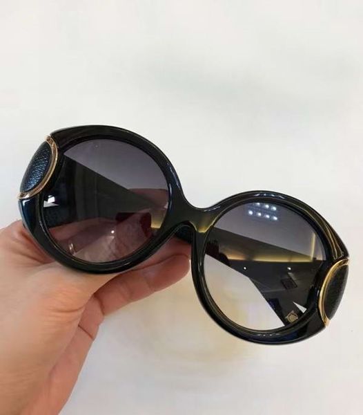 oval sunglasses 811 leather black frame grey shadeddes lunettes de soleil women fashion sunglasses new with box, White;black
oval sunglasses 811 leather black frame grey shadeddes lunettes de soleil women fashion sunglasses new with box, White;black