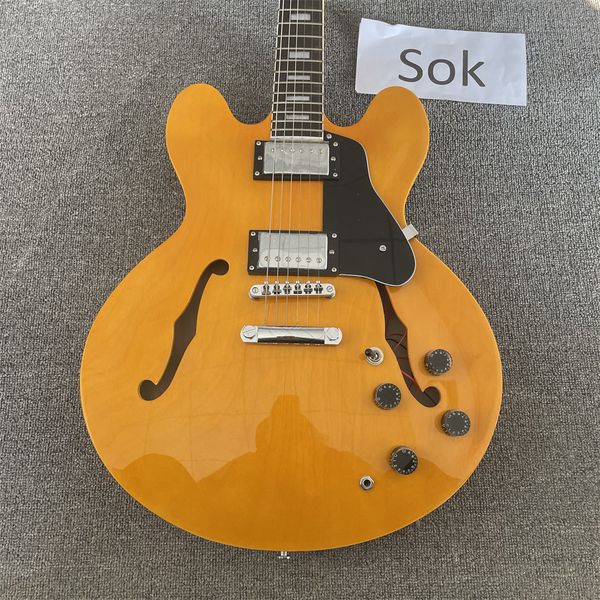 delivery, orange electric guitar, hollow body ,rosewood fingerboard , electric guitar
delivery, orange electric guitar, hollow body ,rosewood fingerboard , electric guitar