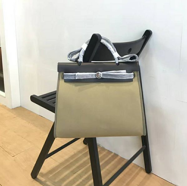 new canvas kelly portable one shoulder messenger contrast color matching women's fashion versatile bag
new canvas kelly portable one shoulder messenger contrast color matching women's fashion versatile bag
