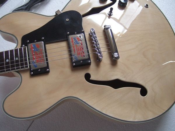 flyoung g-335 semi hollow double f hole electric guitar log color piano body point product jade button can add suitcase
flyoung g-335 semi hollow double f hole electric guitar log color piano body point product jade button can add suitcase