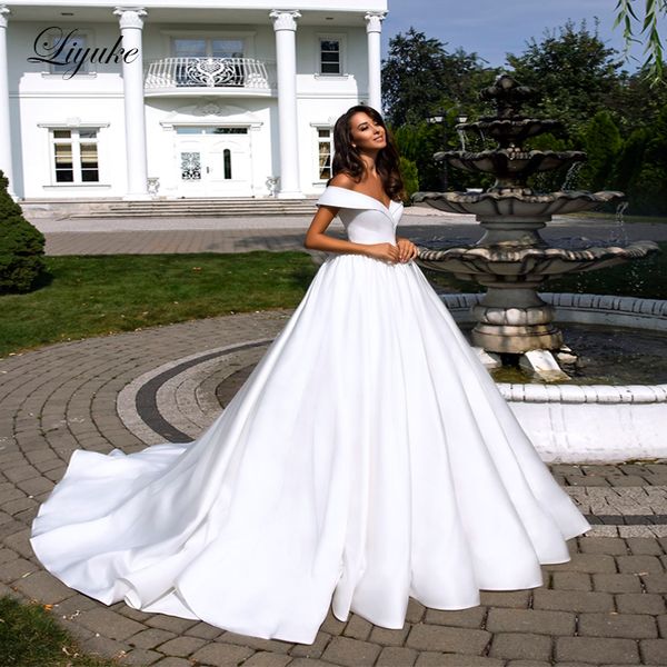 liyuke pure white elegant ribbon connection wedding dress neck on v folden' shoulder
liyuke pure white elegant ribbon connection wedding dress neck on v folden' shoulder