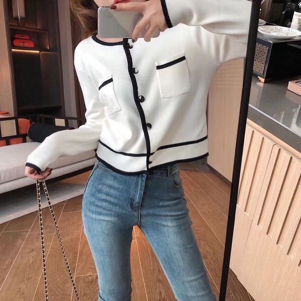 black and white contrast stitching fashion button sweater women's autumn temperament slim cardigan short jacket -s/xl, White;black
black and white contrast stitching fashion button sweater women's autumn temperament slim cardigan short jacket -s/xl, White;black