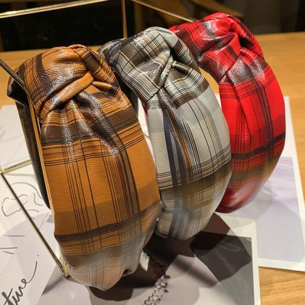 sell retro styles wide edge headhoop women fashion cross knot hair hoops ladies pu leather grid pattern printed hair accessories, Black;brown
sell retro styles wide edge headhoop women fashion cross knot hair hoops ladies pu leather grid pattern printed hair accessories, Black;brown