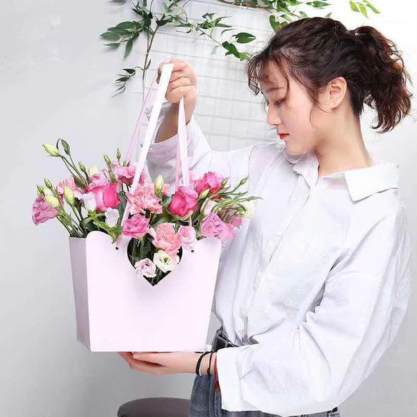 gift wrap 5pcs flower paper box packaging bag thickening waterproof kraft handbags hollow out heart-shaped wedding bouquet pochette1
gift wrap 5pcs flower paper box packaging bag thickening waterproof kraft handbags hollow out heart-shaped wedding bouquet pochette1