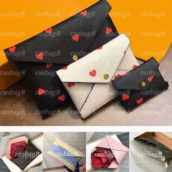 5 colors women's fashion handbags 3-in-1 pouch envelope pochette clutch bags black leather with heart design purse passport coins pocke
5 colors women's fashion handbags 3-in-1 pouch envelope pochette clutch bags black leather with heart design purse passport coins pocke