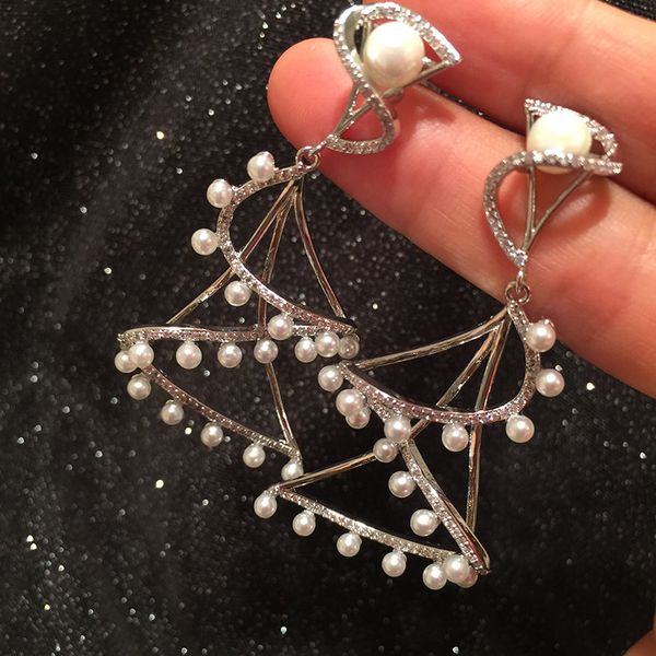 s925 silver needle micro-inlaid zircon hourglass curve earrings luxury s-shaped ribbon earrings inlaid with pearl elegant earrings
s925 silver needle micro-inlaid zircon hourglass curve earrings luxury s-shaped ribbon earrings inlaid with pearl elegant earrings