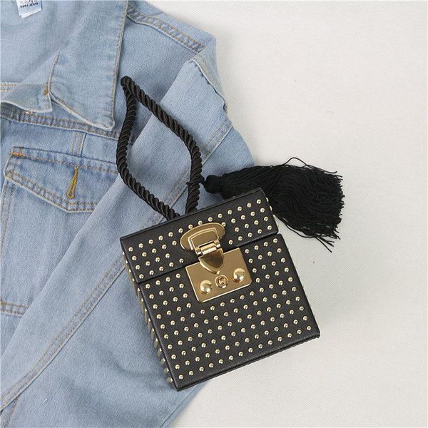 punk fashion black pu gold studded retro buckle tassel women party handbag bag box design bag female clutch
punk fashion black pu gold studded retro buckle tassel women party handbag bag box design bag female clutch