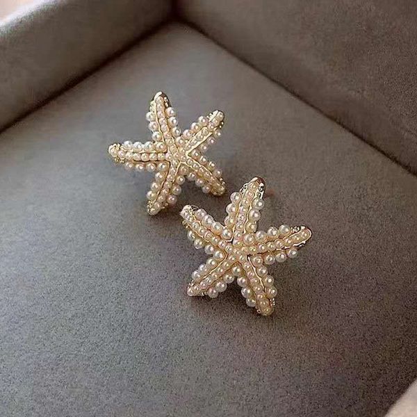 925 silver simple and compact starfish pearl earrings female south korea all-match cold elegant cool student earrings, Golden
925 silver simple and compact starfish pearl earrings female south korea all-match cold elegant cool student earrings, Golden