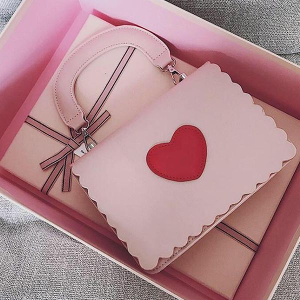 sweet pink women pu leather shoulder bag small red heart crossbody bag ladies flap messenger candy color handle bags 
sweet pink women pu leather shoulder bag small red heart crossbody bag ladies flap messenger candy color handle bags