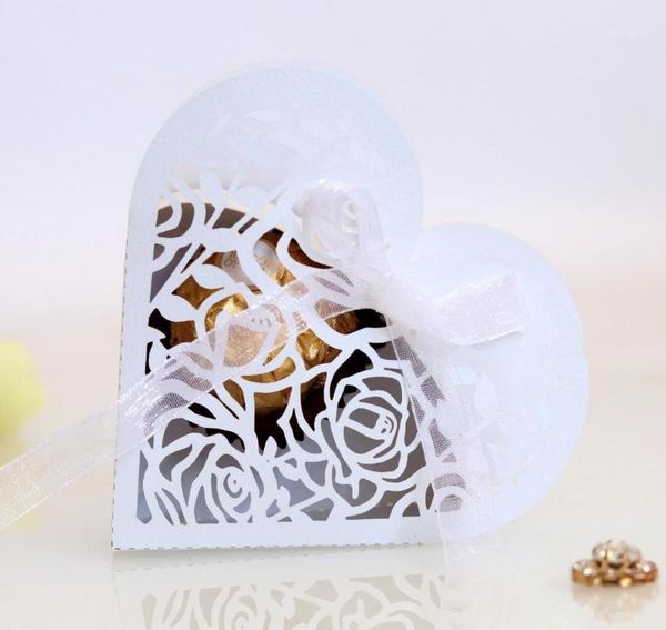 white/ivory heart shaped laser cut hollow rose candy box wedding party favors gift bag with ribbon1
white/ivory heart shaped laser cut hollow rose candy box wedding party favors gift bag with ribbon1
