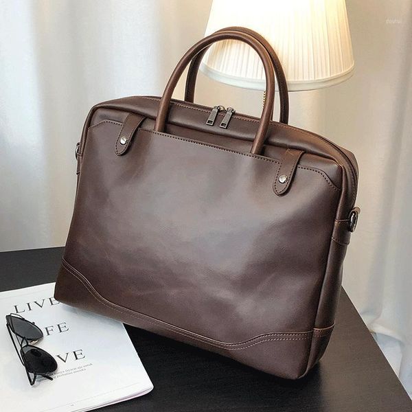 briefcases fashion designer 14 inch lapbriefcase business handbag for men large capacity men's leather shoulder bag1
briefcases fashion designer 14 inch lapbriefcase business handbag for men large capacity men's leather shoulder bag1
