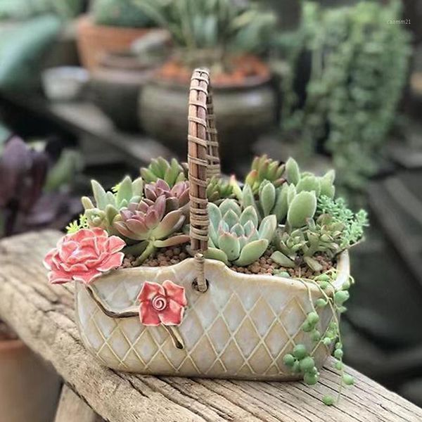 flower basket portable fleshy flowerpot ceramic creative flower pinching green plant rough pottery pot1
flower basket portable fleshy flowerpot ceramic creative flower pinching green plant rough pottery pot1