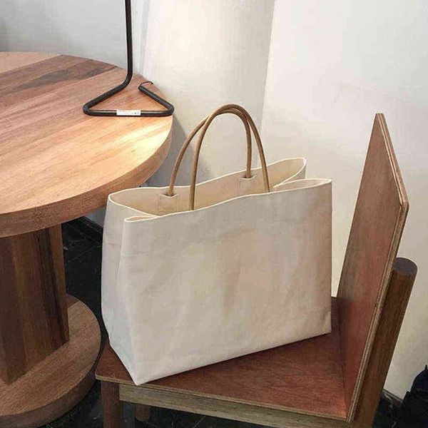 shopping bags large capacity canvas handbag for women leisure big shoulder solid color handle environmental lady purse 220307
shopping bags large capacity canvas handbag for women leisure big shoulder solid color handle environmental lady purse 220307