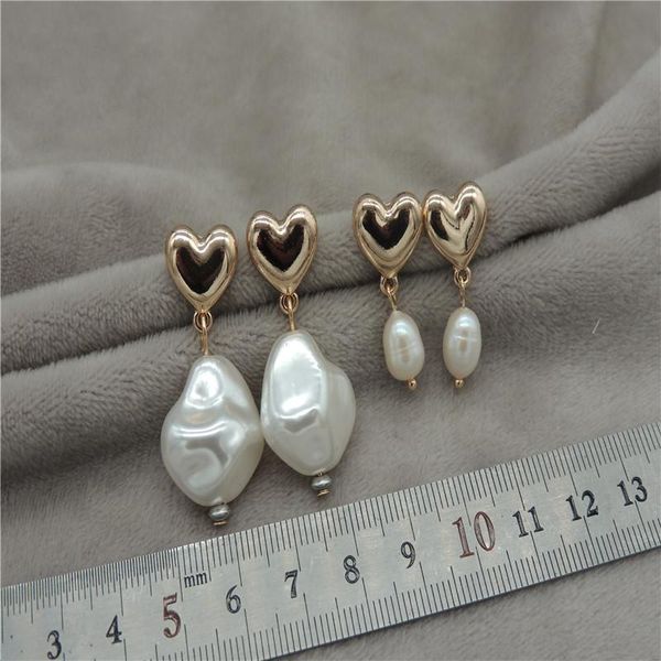 jewelry manufacturers direct sales exquisite european and american goddess fashion luxury sweet metal pearl earrings h40, Golden;silver
jewelry manufacturers direct sales exquisite european and american goddess fashion luxury sweet metal pearl earrings h40, Golden;silver