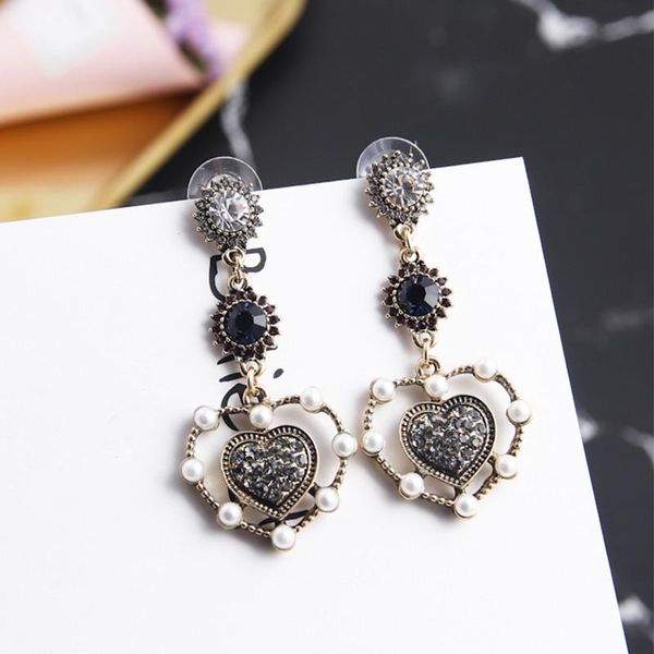 vintage pearl hollow love heart long dangle earrings for women trendy temperament rhinestone drop earring jewelry brincos, Silver
vintage pearl hollow love heart long dangle earrings for women trendy temperament rhinestone drop earring jewelry brincos, Silver